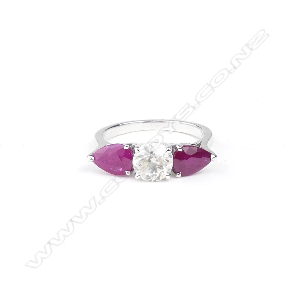 A 14ct white gold diamond and ruby ring Image 1++