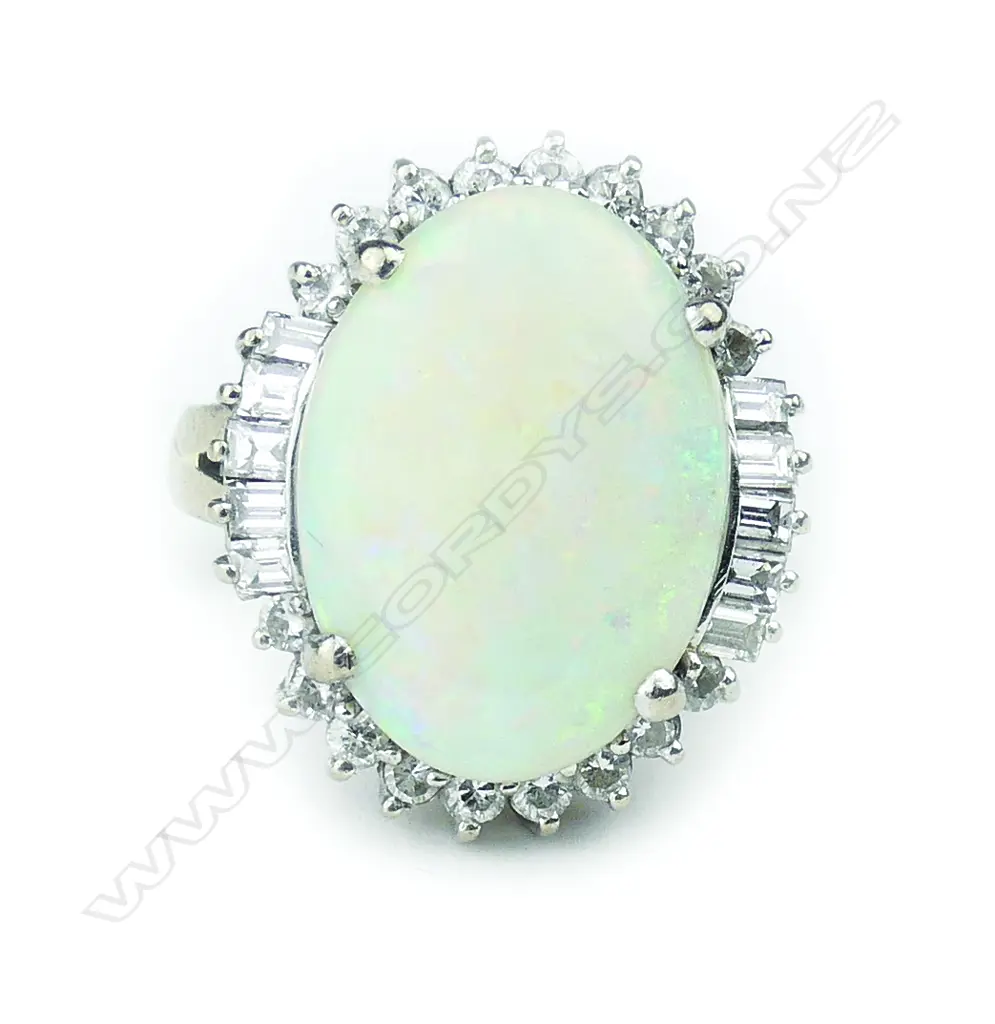 An impressive lady’s opal and diamond dress ring Image 1++