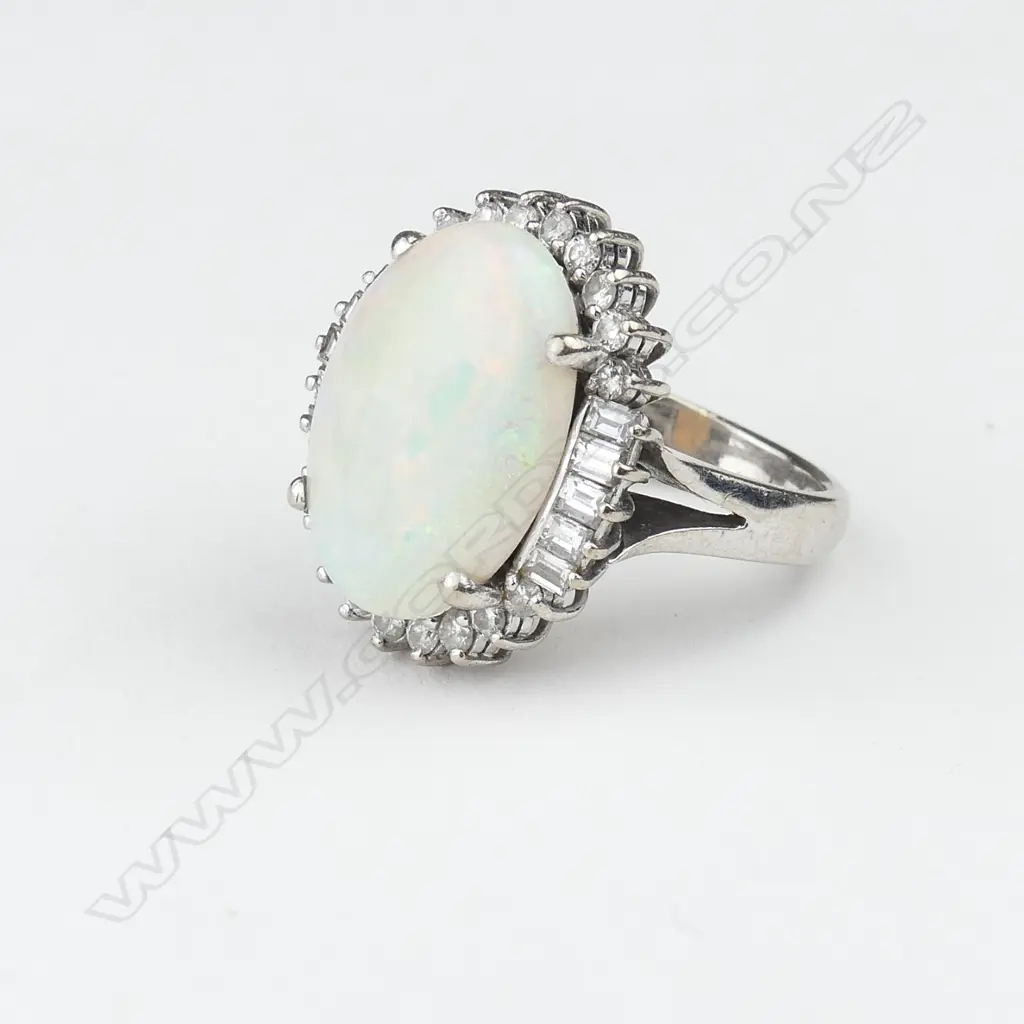 An impressive lady’s opal and diamond dress ring Image 1++