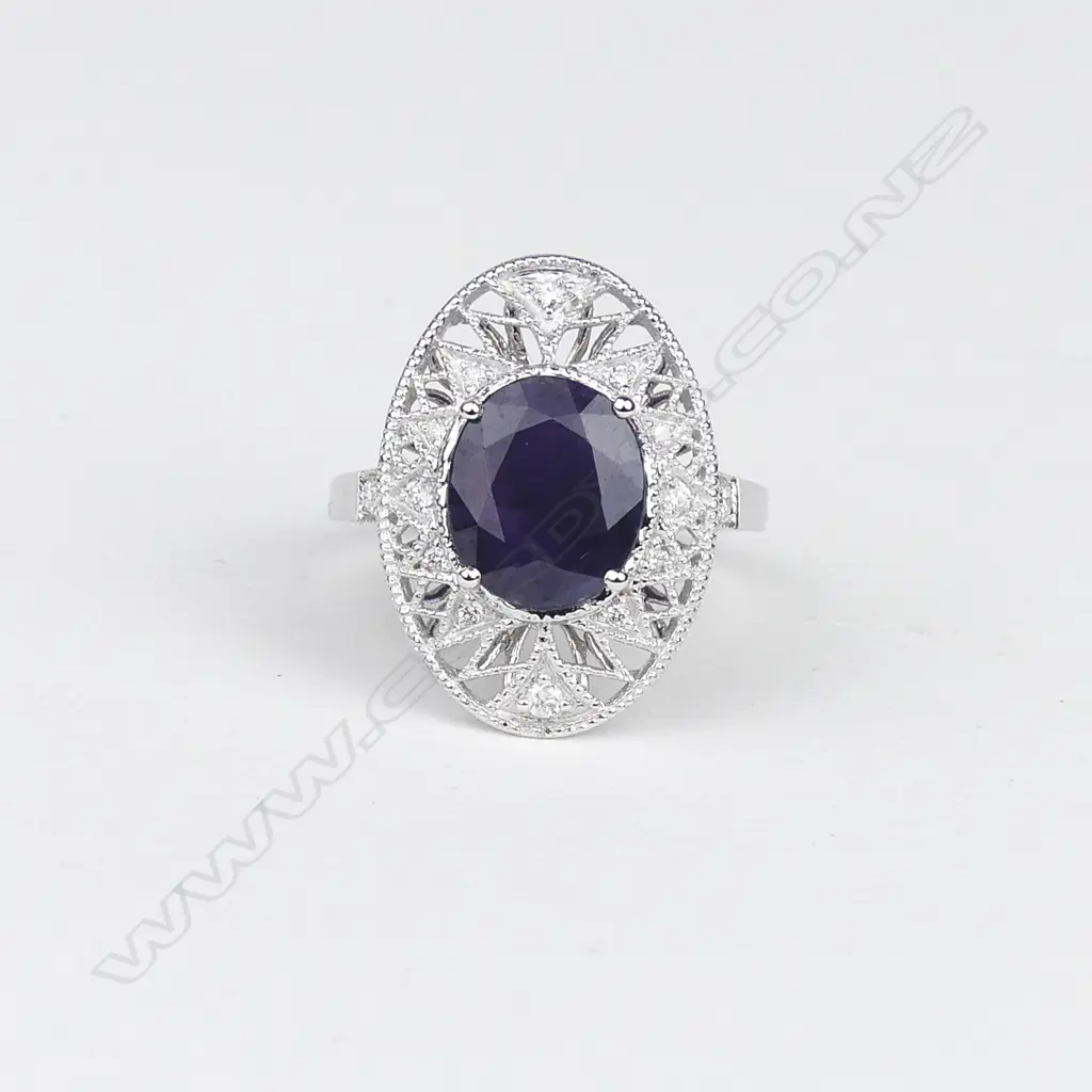 An 18ct white gold sapphire and diamond Art Deco style ring Image 1++
