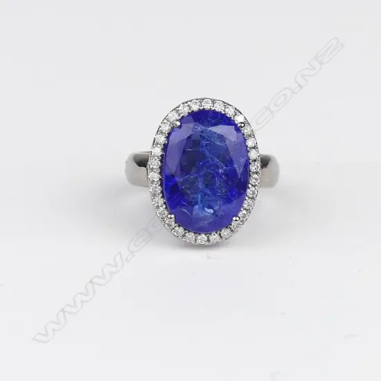 An 18ct white gold tanzanite and diamond ring