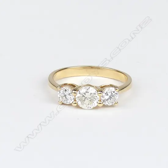 A 14ct gold and three stone diamond ring