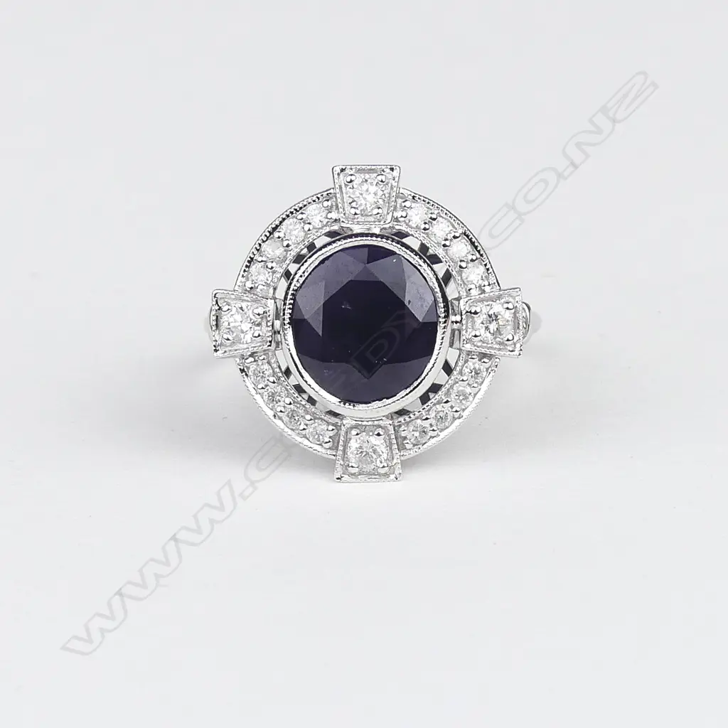 An 18ct white gold sapphire and diamond Art Deco style ring Image 1++