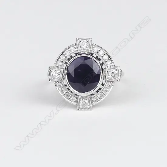An 18ct white gold sapphire and diamond Art Deco style ring