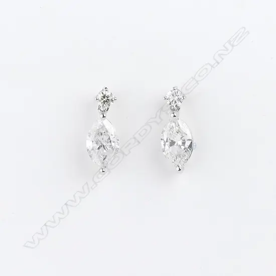 A pair of 14ct white gold and diamond drop earrings