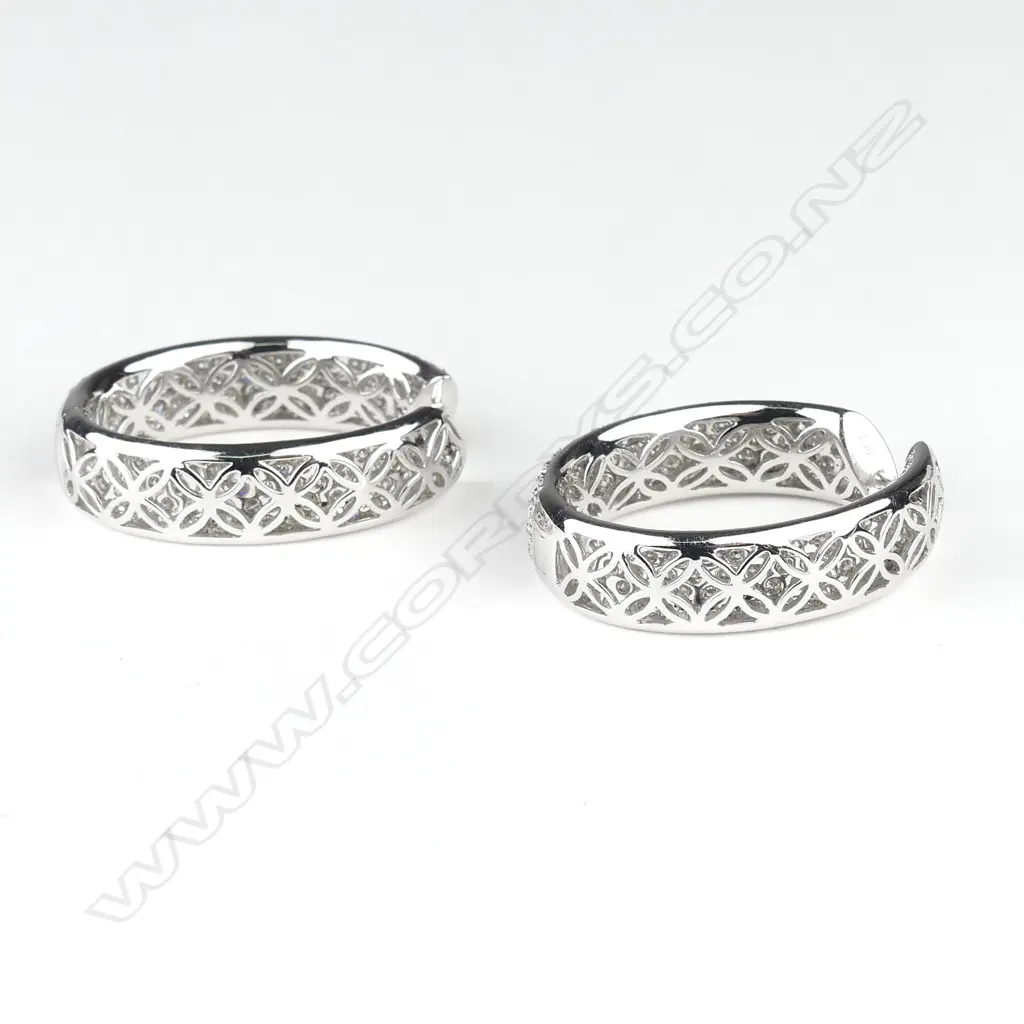 A pair of impressive lady's 18ct. white gold and multi-diamond large hoop earrings Image 1++