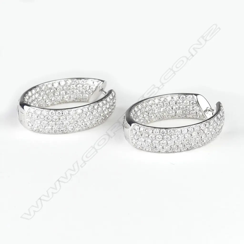 A pair of impressive lady's 18ct. white gold and multi-diamond large hoop earrings Image 1++