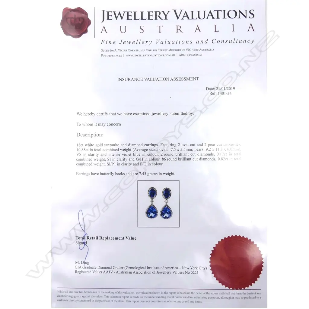 A pair of 18ct white gold tanzanite and diamond drop earrings Image 1++
