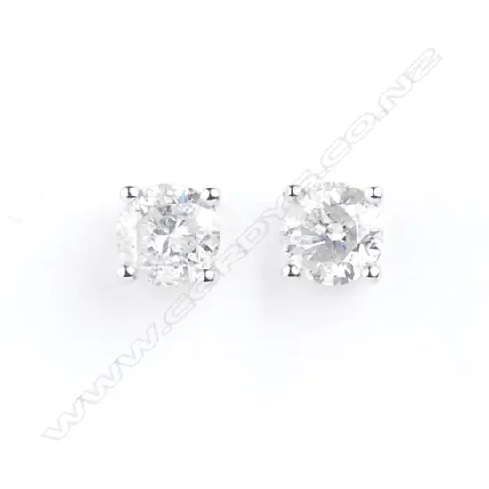 A pair of 14ct white gold and diamond stud earrings