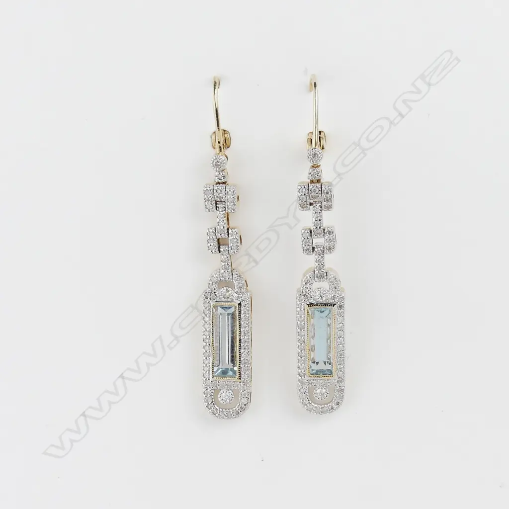 A pair of 14ct gold aquamarine and diamond drop earrings Image 1++