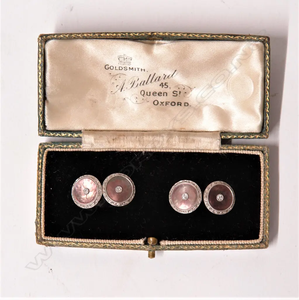 A pair of 14ct. yellow gold mother-of-pearl and diamond gent's cuff links Image 1++
