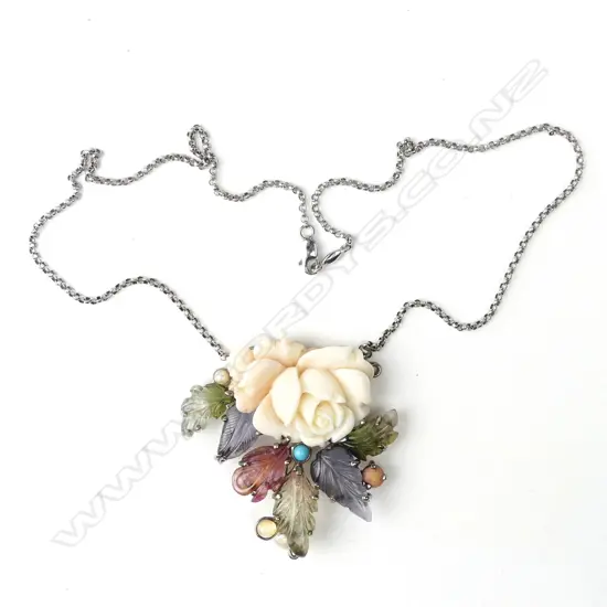 An antique style handmade 18ct gold coral and tourmaline pendant