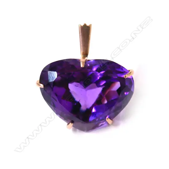 A retro gold mounted large striking amethyst pendant
