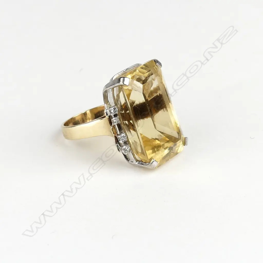 A lady's vintage large citrine and diamond 9ct. yellow gold ring Image 1++