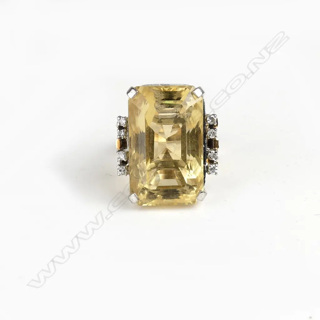 A lady's vintage large citrine and diamond 9ct. yellow gold ring Image 1++