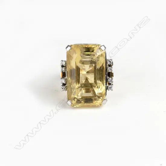 A lady's vintage large citrine and diamond 9ct. yellow gold ring