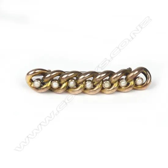 A 9ct rose gold and pearl brooch