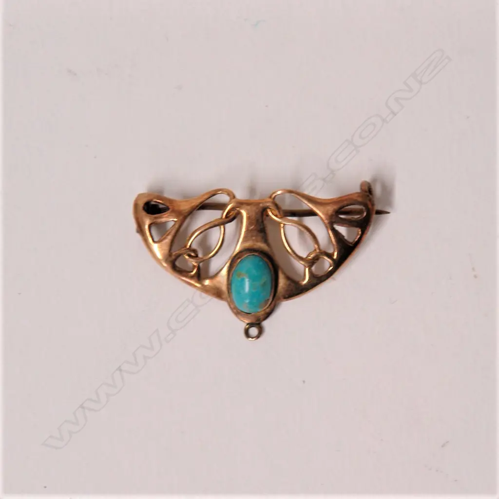 An Edwardian 9ct. yellow gold and turquoise Art Nouveau brooch Image 1++
