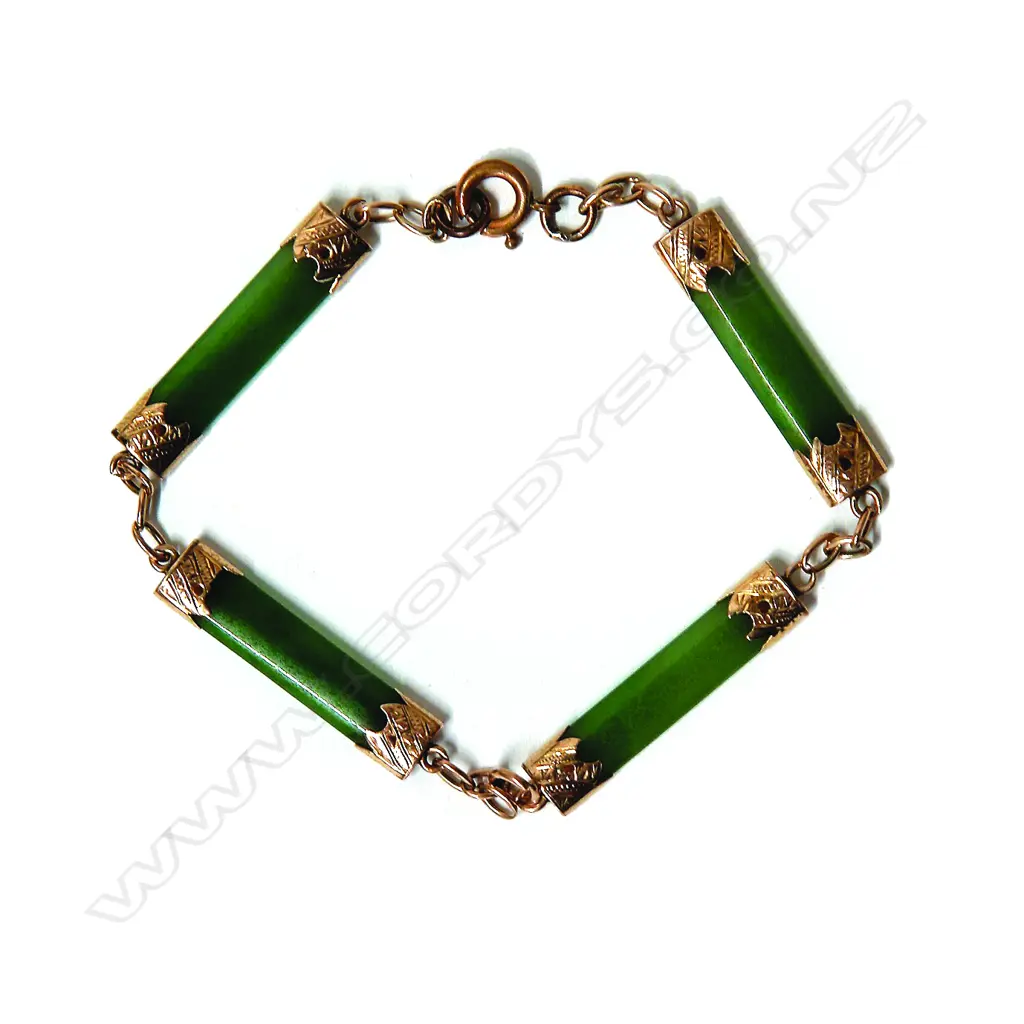 An Edwardian greenstone bar and gold mounted bracelet Image 1++