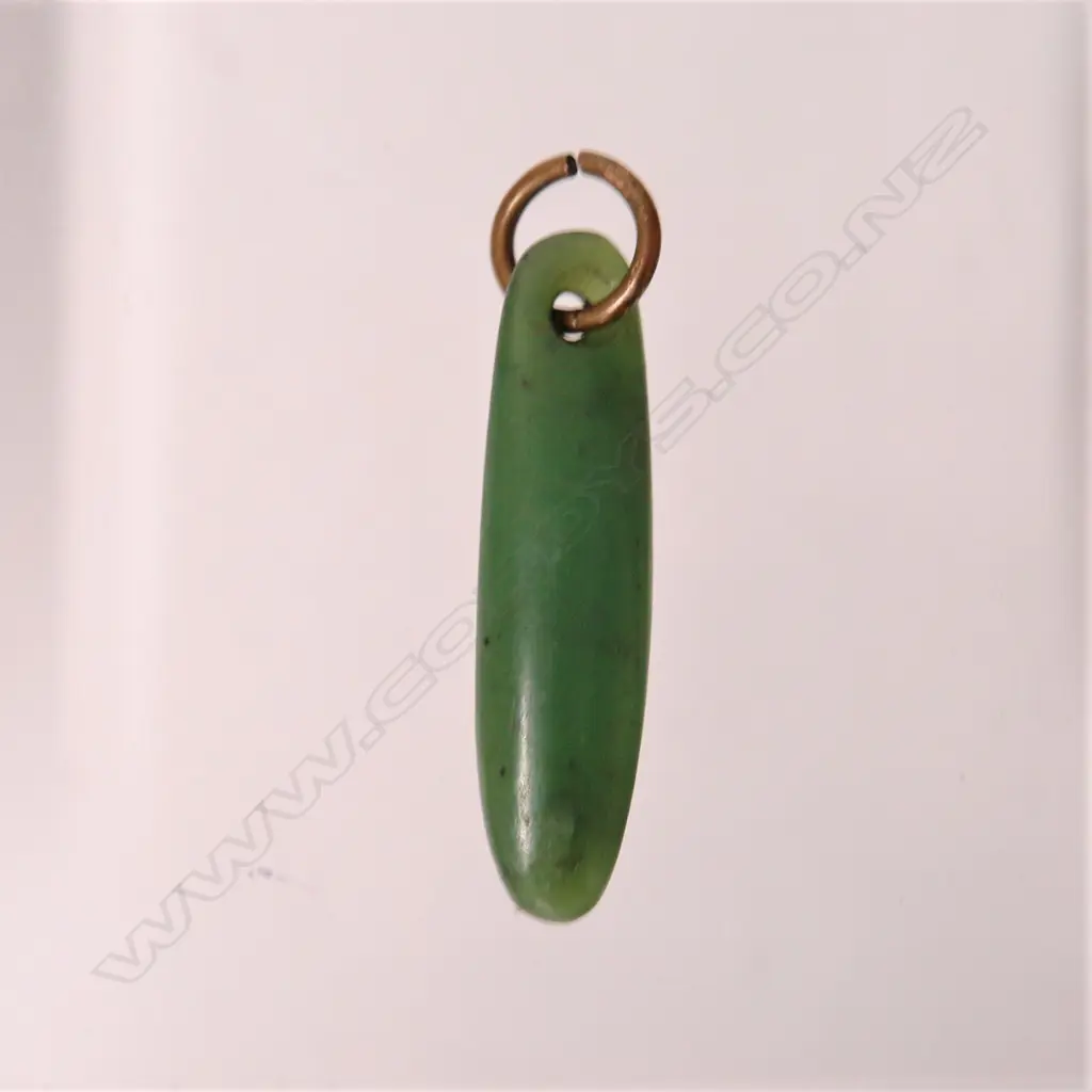 An old greenstone pendant of torpedo form Image 1++