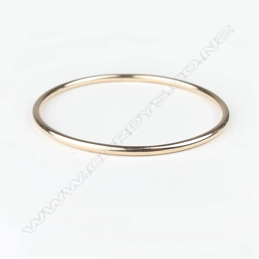 A c.1900 9ct. rose gold bangle made by William Good of Gisborne Image 1++