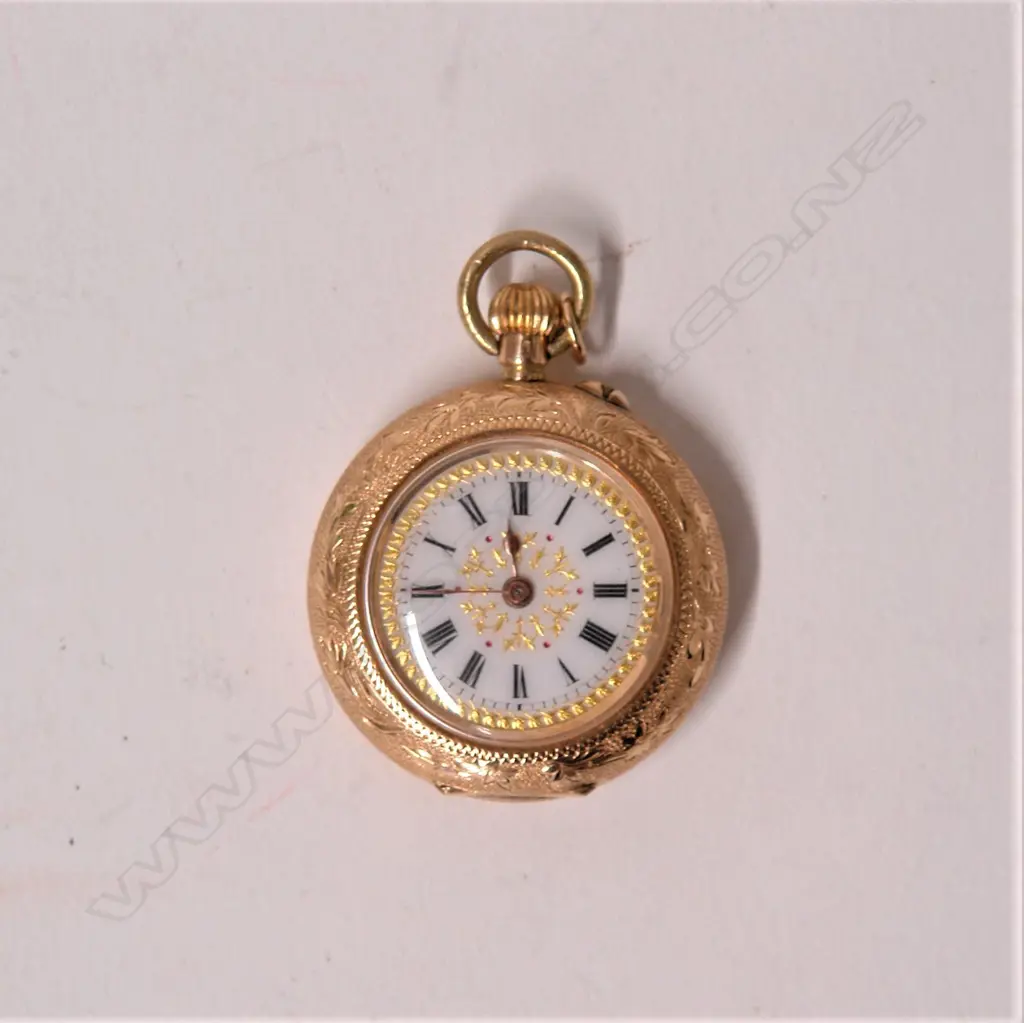 An early 20thC 14ct. yellow gold and enamelled lady's open face fob watch Image 1++