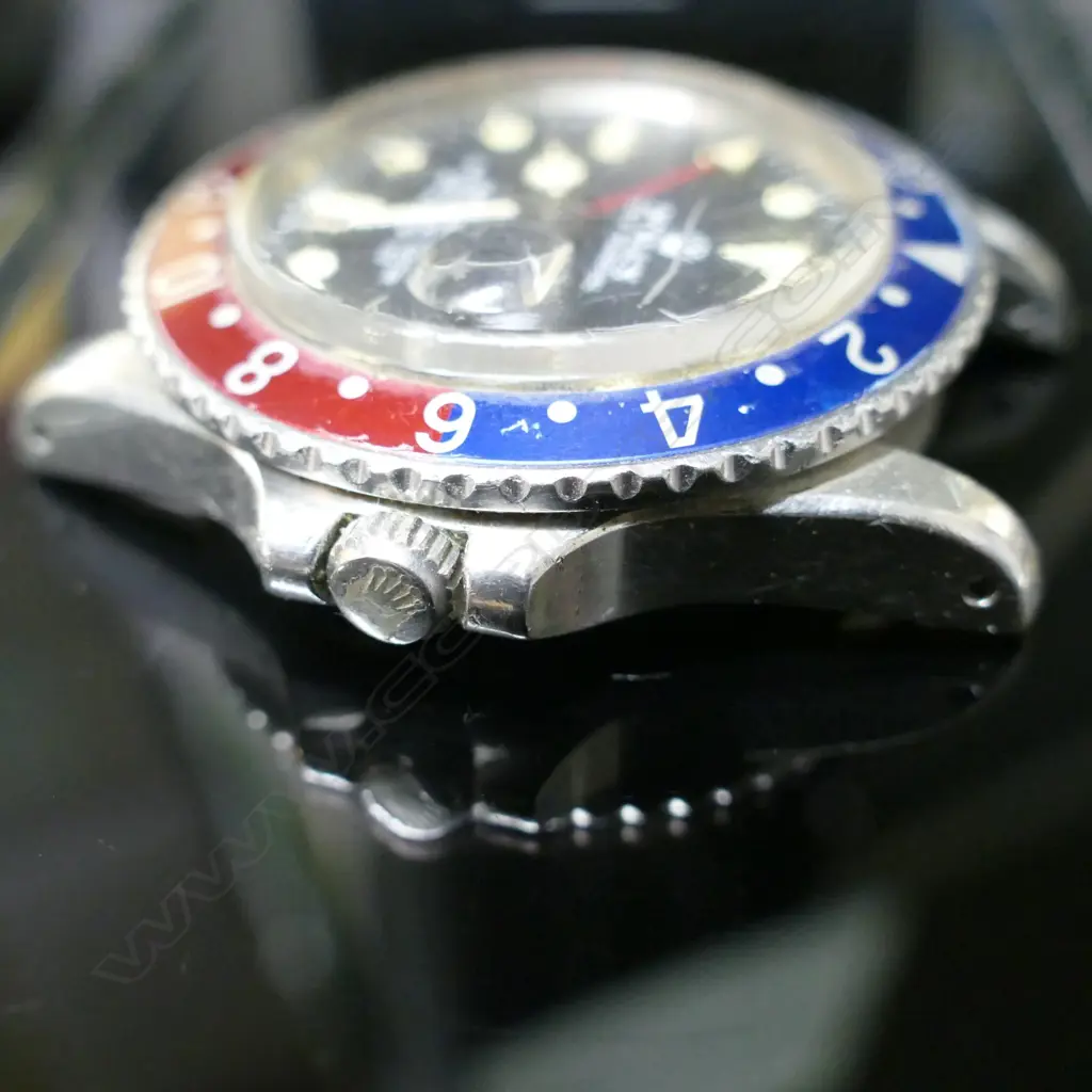 A Rolex Oyster Perpetual GMT-Master 'Pepsi' bezel 'Superlative Chronometer' wristwatch Image 1++
