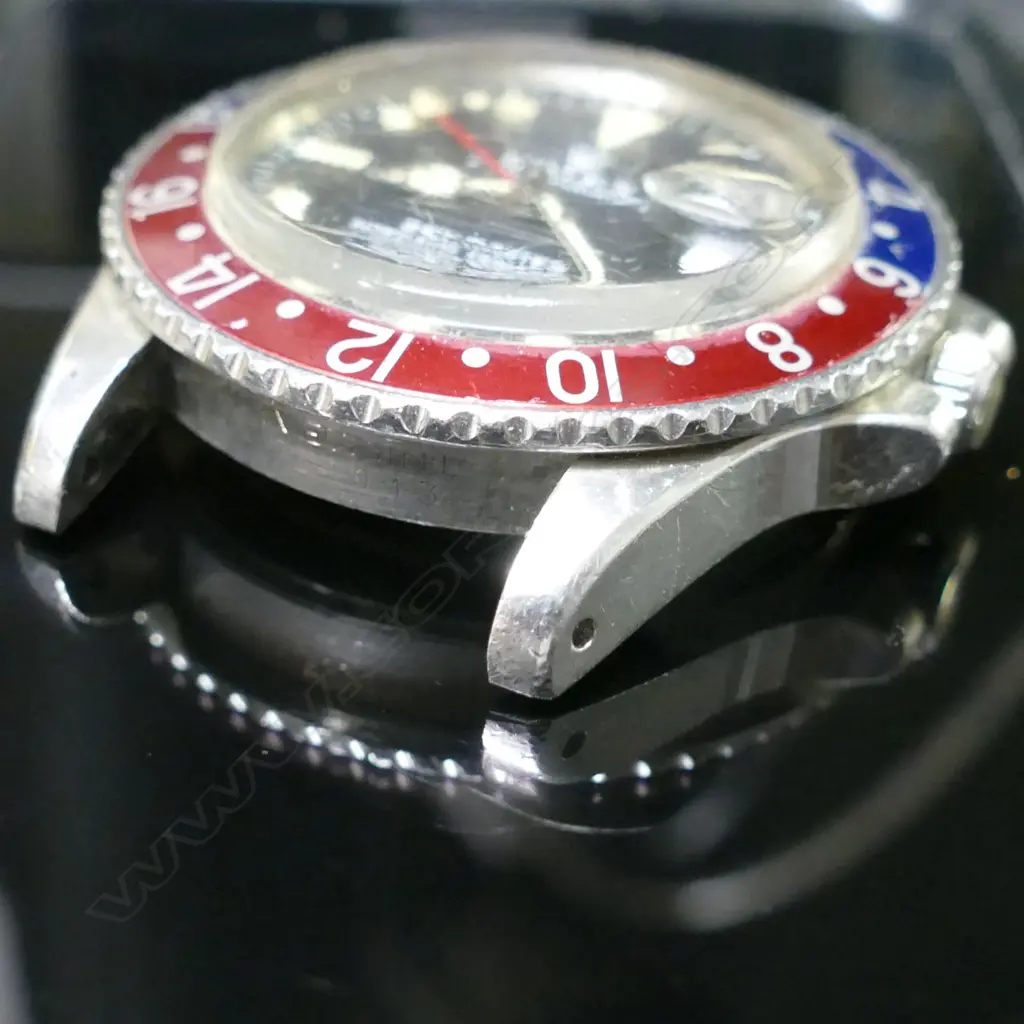 A Rolex Oyster Perpetual GMT-Master 'Pepsi' bezel 'Superlative Chronometer' wristwatch Image 1++