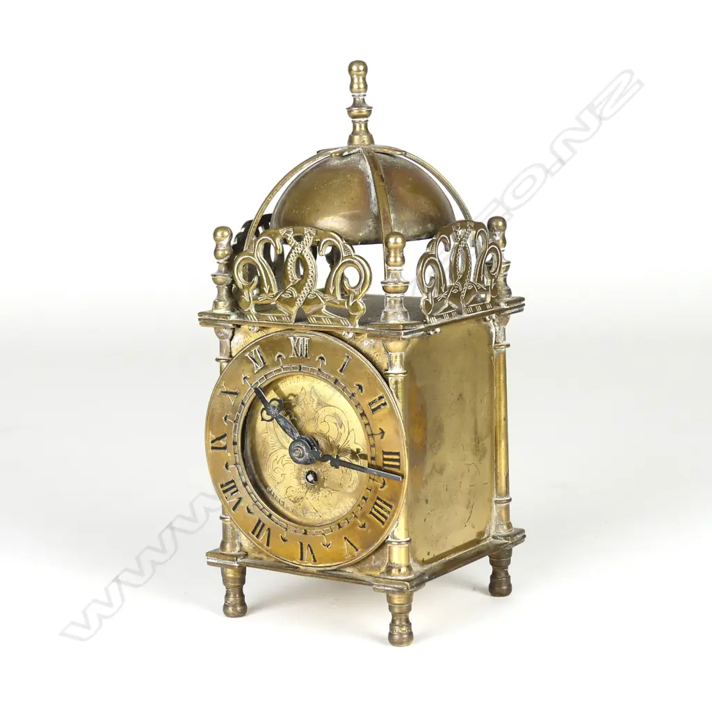 A Smith's British brass cased miniature lantern clock Image 1++