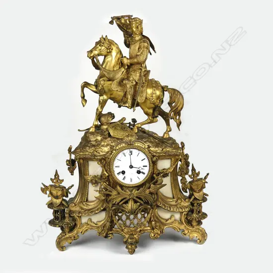 An ornate 19thC French spelter gilt mantel clock by Henry Marc