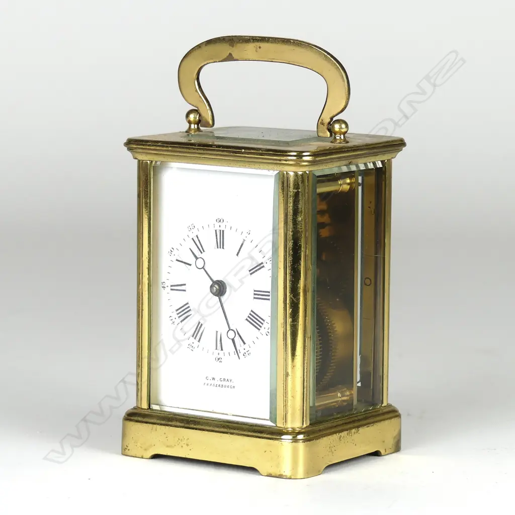 A brass cased carriage clock Image 1++