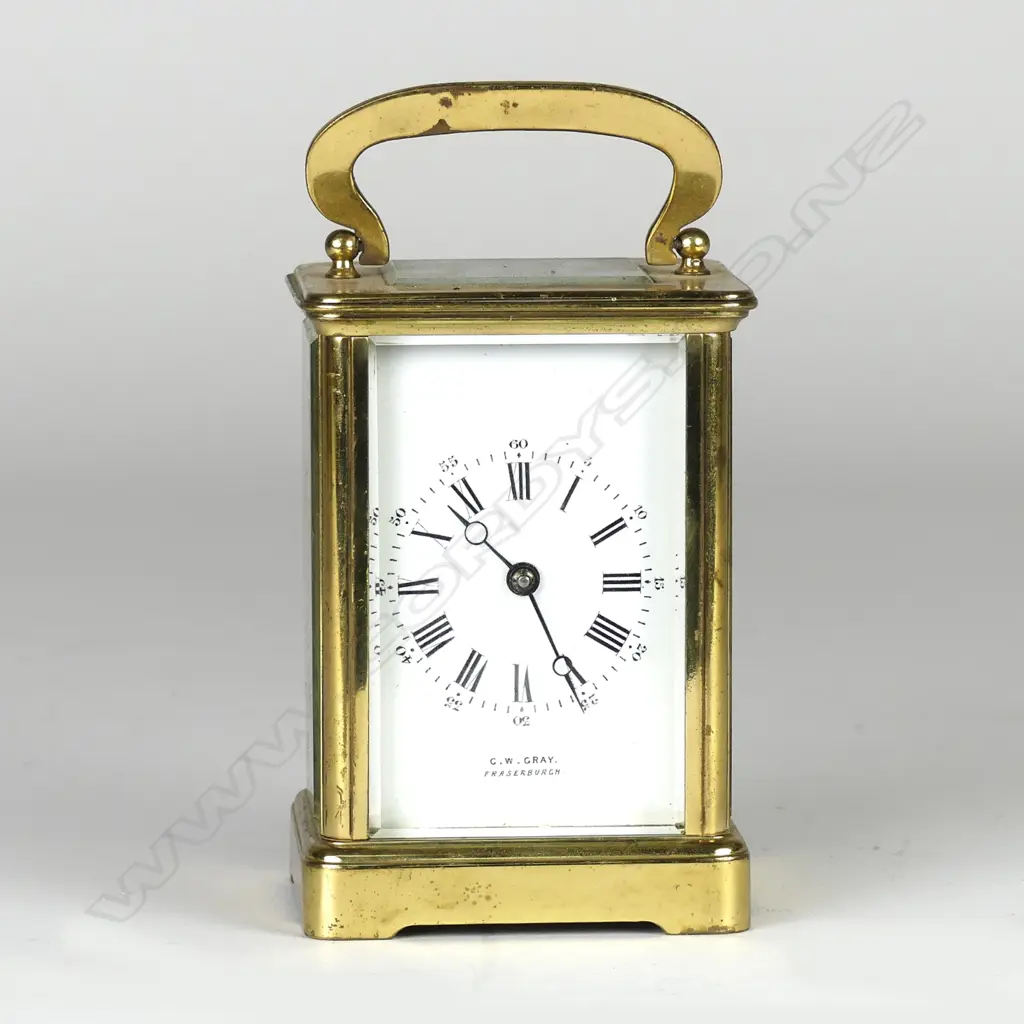 A brass cased carriage clock Image 1++