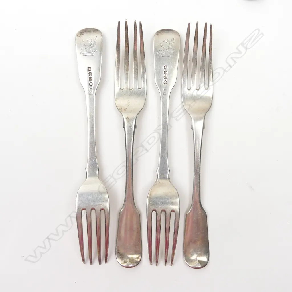 Four Geo IV silver table forks Image 1++