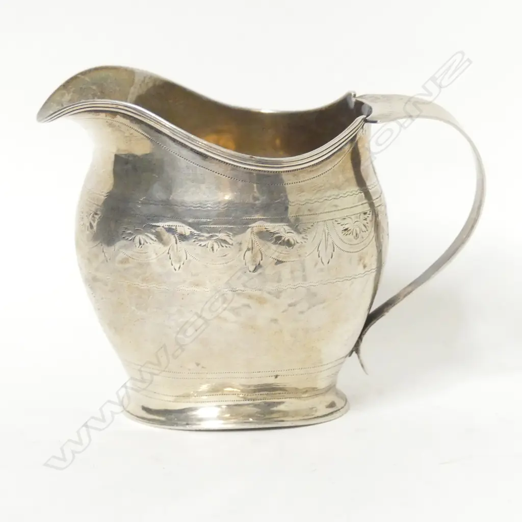 A Geo III silver cream jug Image 1++