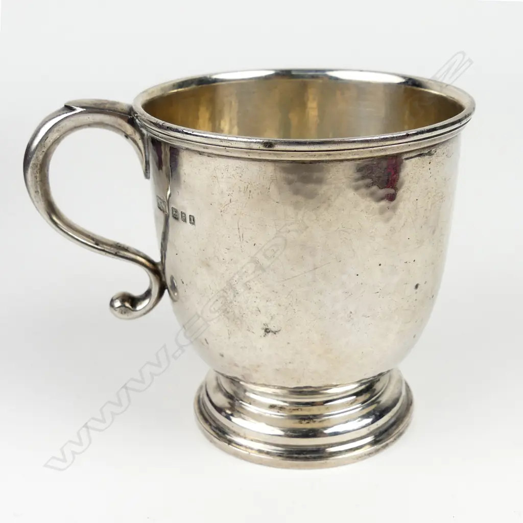 A silver mug Image 1++