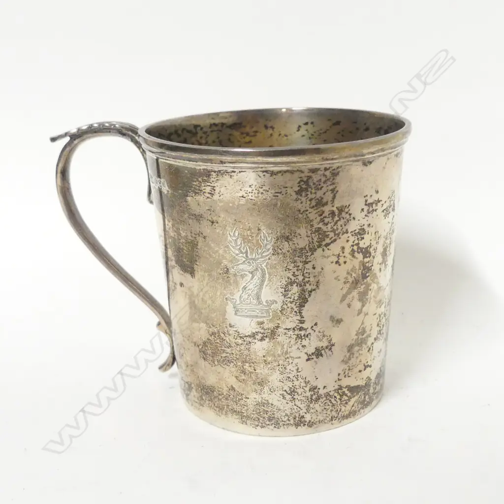 A silver mug Image 1++