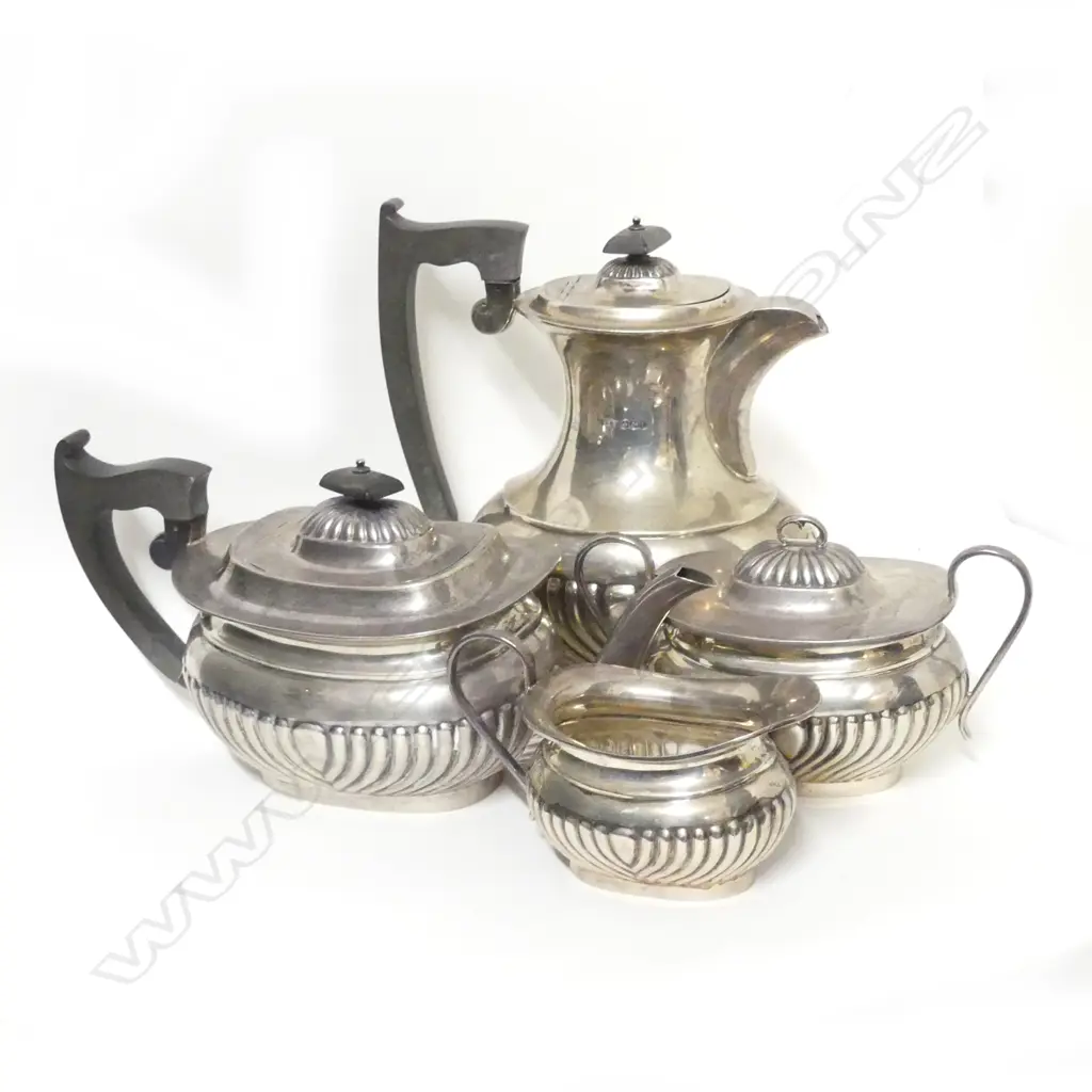 A Georgian Revival silver four piece tea set Image 1++
