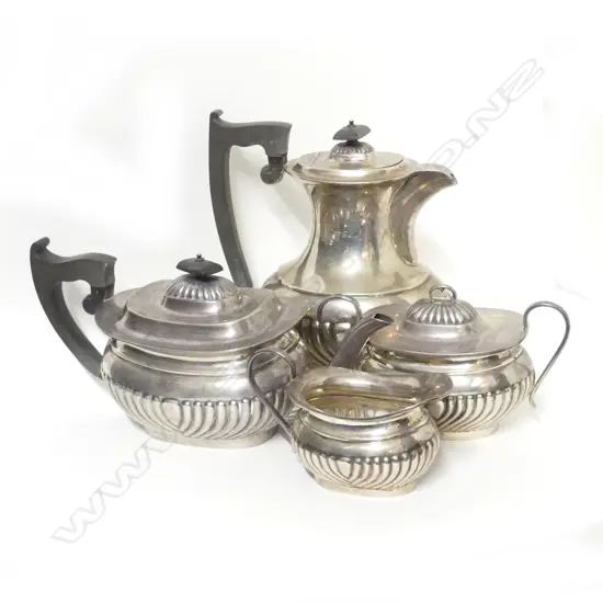 A Georgian Revival silver four piece tea set