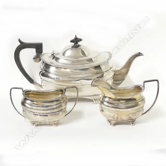 A Georgian Revival silver three piece sea set