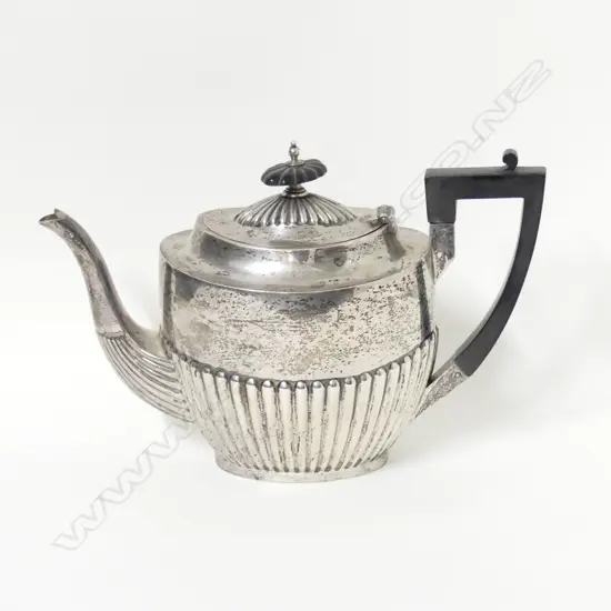 A Georgian Revival silver tea pot