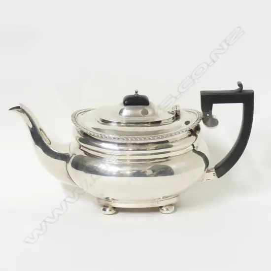 A Georgian Revival silver teapot