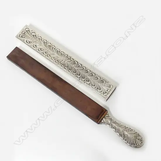 A Victorian silver cased razor strop
