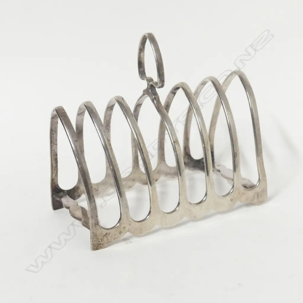 A silver toast rack Image 1++