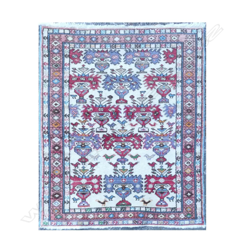 A small Turkish hand knotted rug Image 1++