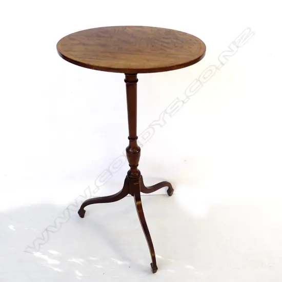 A Sheraton Revival flame mahogany wine table of small and elegant proportions
