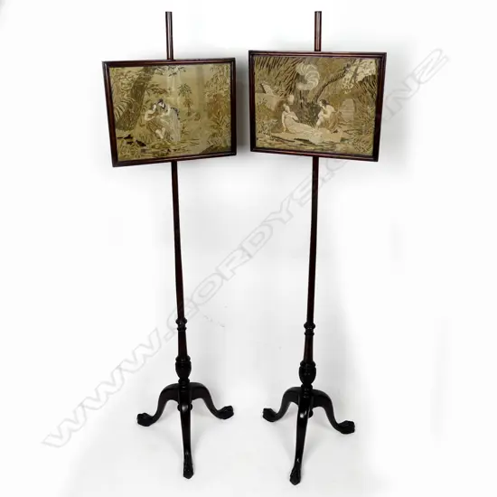 A pair of Georgian mahogany pole screens