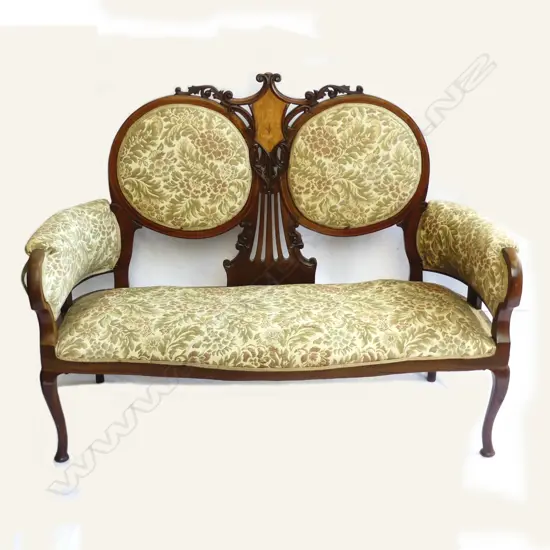 An Edwardian Sheraton Revival parlour seat