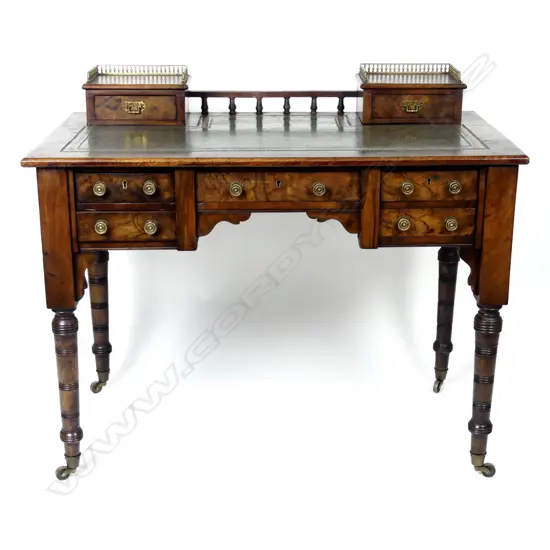 A small Victorian walnut library desk