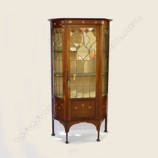 A mahogany Art Nouveau leadlight display cabinet