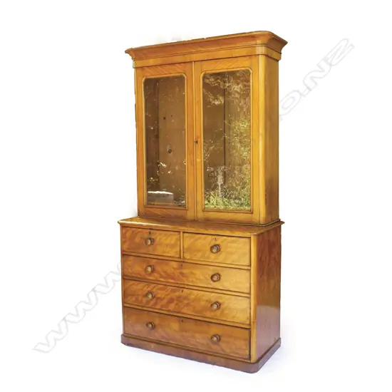 A Victorian satin birch bookcase chest